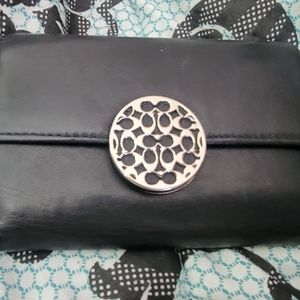 Used coach Alexandra wallet. Please review photos